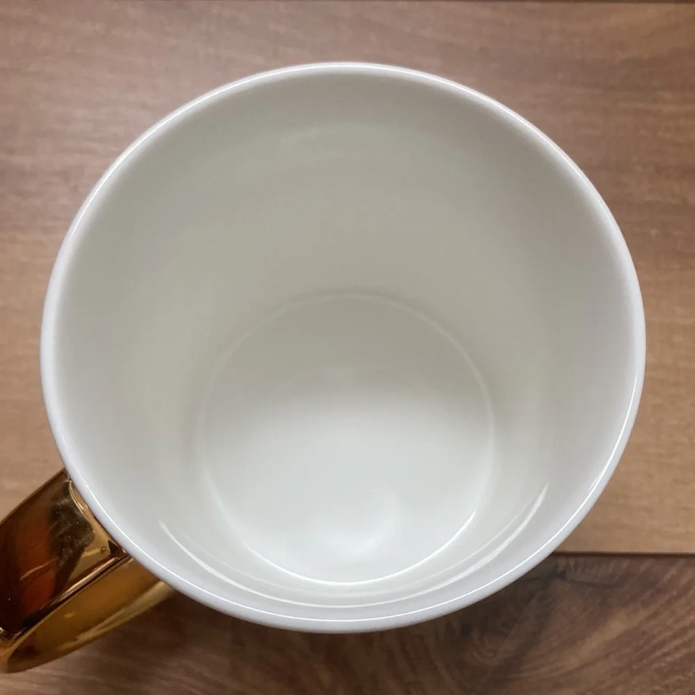Starbucks 2015 14 ounce coffee mug.
